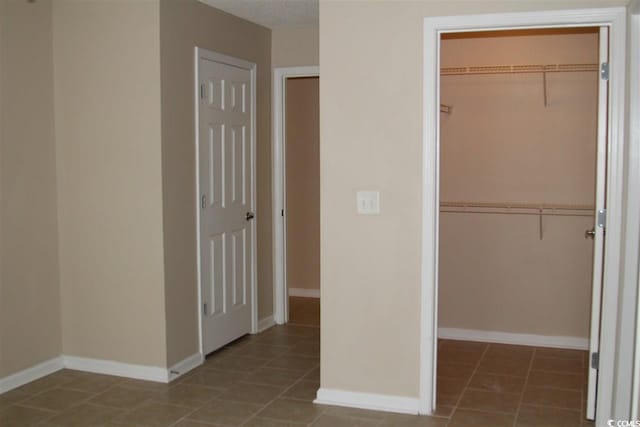 interior space with tile patterned floors