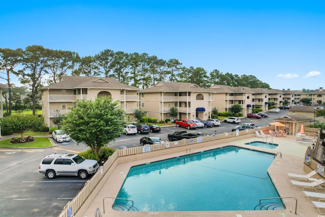 view of swimming pool featuring a patio area