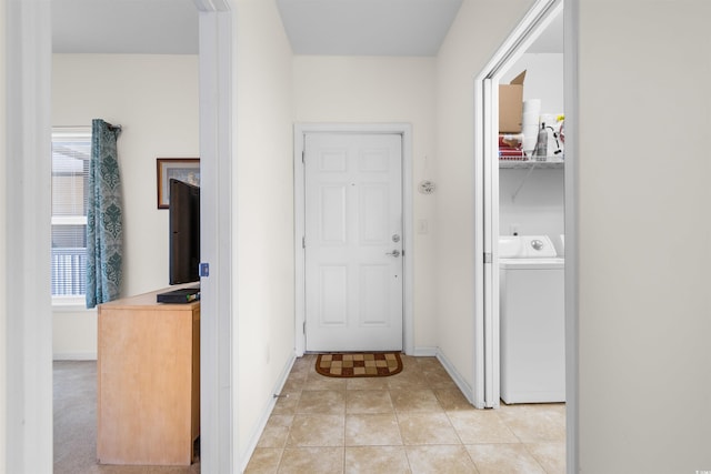 hall featuring light tile patterned floors