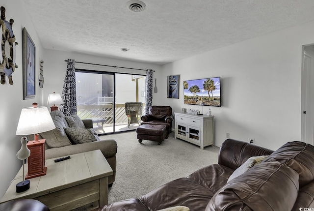 9621 Shore Dr Unit G219, Myrtle Beach, SC 29572 - living area featuring carpet and a textured ceiling