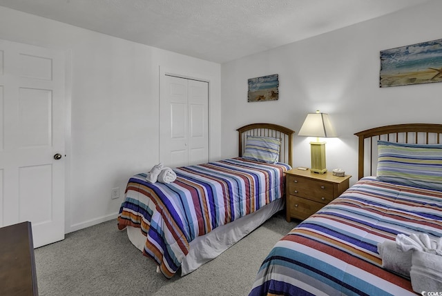 9621 Shore Dr Unit G219, Myrtle Beach, SC 29572 - carpeted bedroom featuring a closet and baseboards