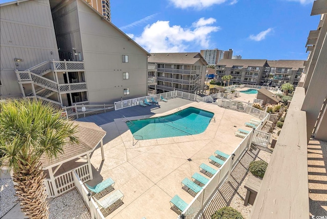 view of swimming pool featuring a patio