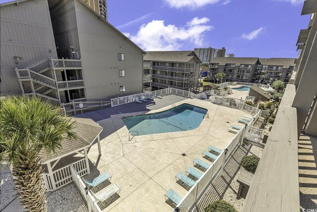9621 Shore Dr Unit G219, Myrtle Beach, SC 29572 - community pool featuring a patio area