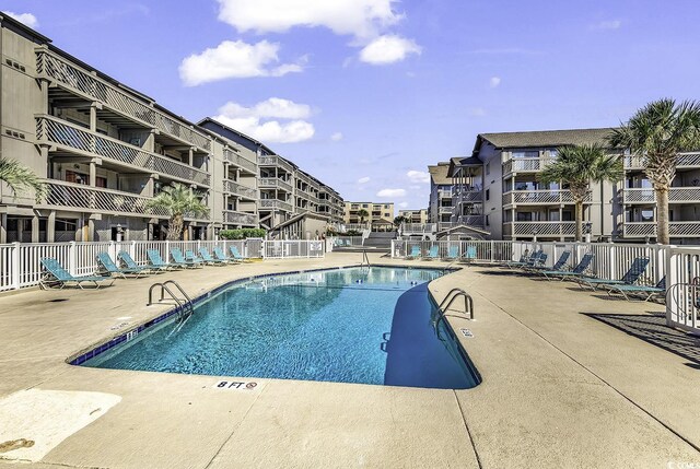 9621 Shore Dr Unit G219, Myrtle Beach, SC 29572 - community pool with a patio