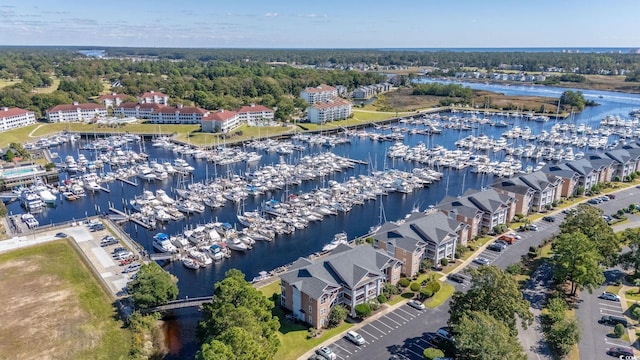 birds eye view of property featuring a water view