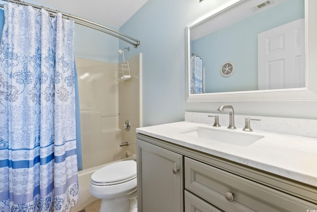 full bathroom with vanity, toilet, and shower / tub combo with curtain