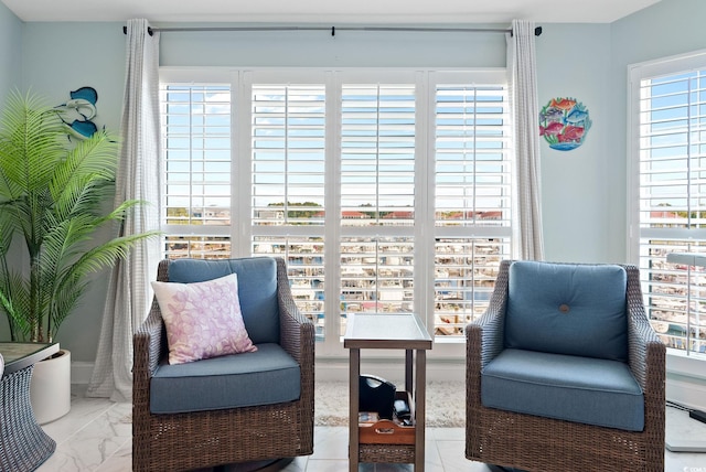 living area featuring plenty of natural light