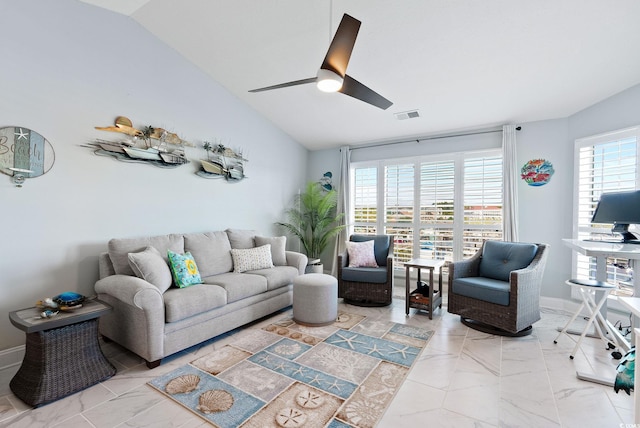 living room with ceiling fan and lofted ceiling