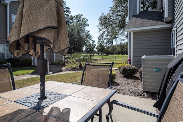 view of patio with central air condition unit