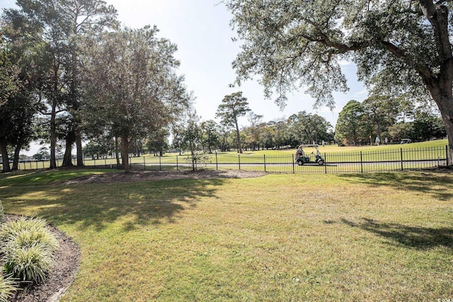 view of yard with a rural view