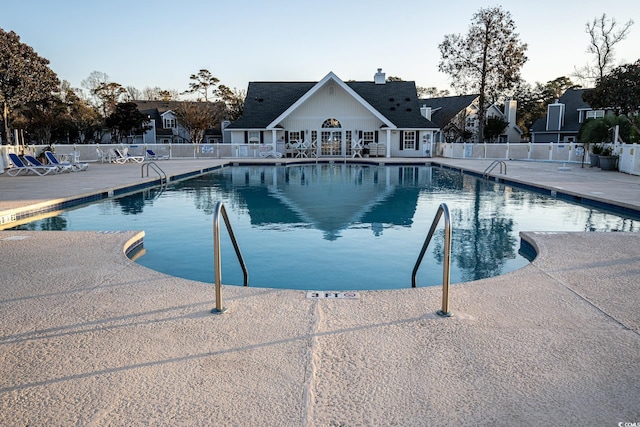 view of swimming pool featuring a patio area