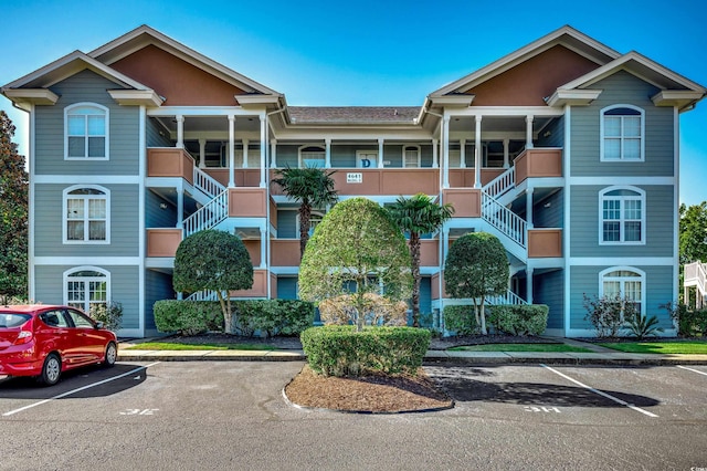 4641 Lightkeepers Way Unit 3-D, Little River, SC 29566 - view of property featuring uncovered parking and stairway