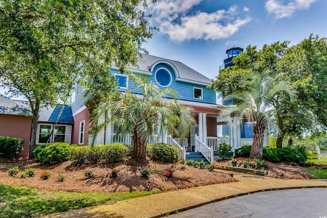 4641 Lightkeepers Way Unit 3-D, Little River, SC 29566 - view of front of house featuring covered porch and a shingled roof