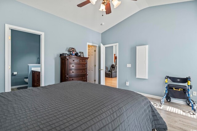 bedroom with ceiling fan, multiple windows, and light hardwood / wood-style flooring