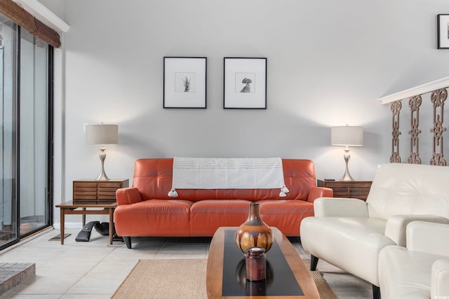 living room with light tile patterned flooring