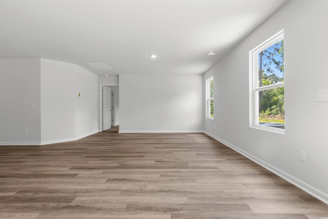 spare room with light wood-type flooring