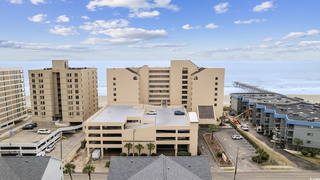 view of building exterior with a water view