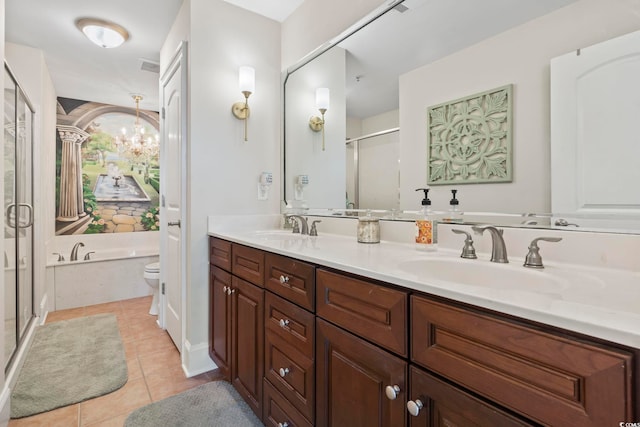 full bathroom with shower with separate bathtub, an inviting chandelier, toilet, vanity, and tile patterned flooring