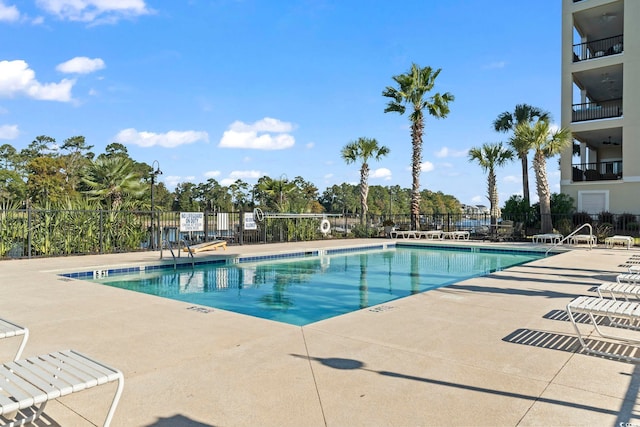 view of swimming pool featuring a patio area