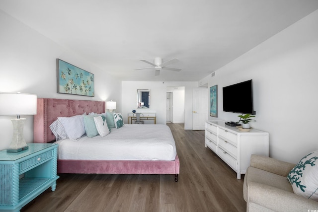 bedroom featuring ceiling fan and dark hardwood / wood-style flooring