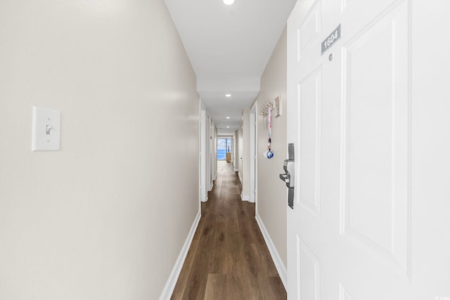 hall featuring dark wood-type flooring