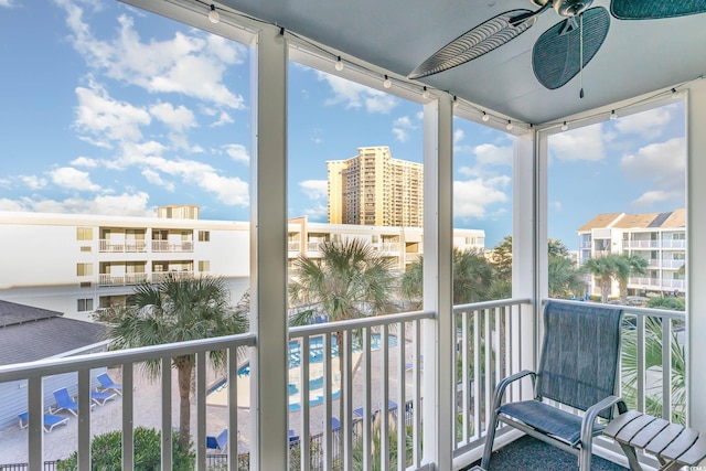 balcony featuring ceiling fan