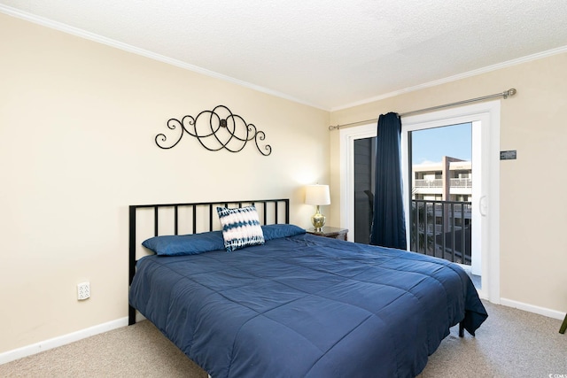 carpeted bedroom featuring access to exterior, ornamental molding, and a textured ceiling