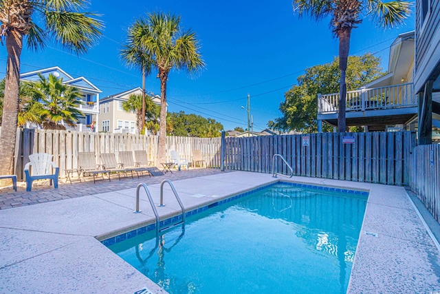 view of pool featuring a patio area