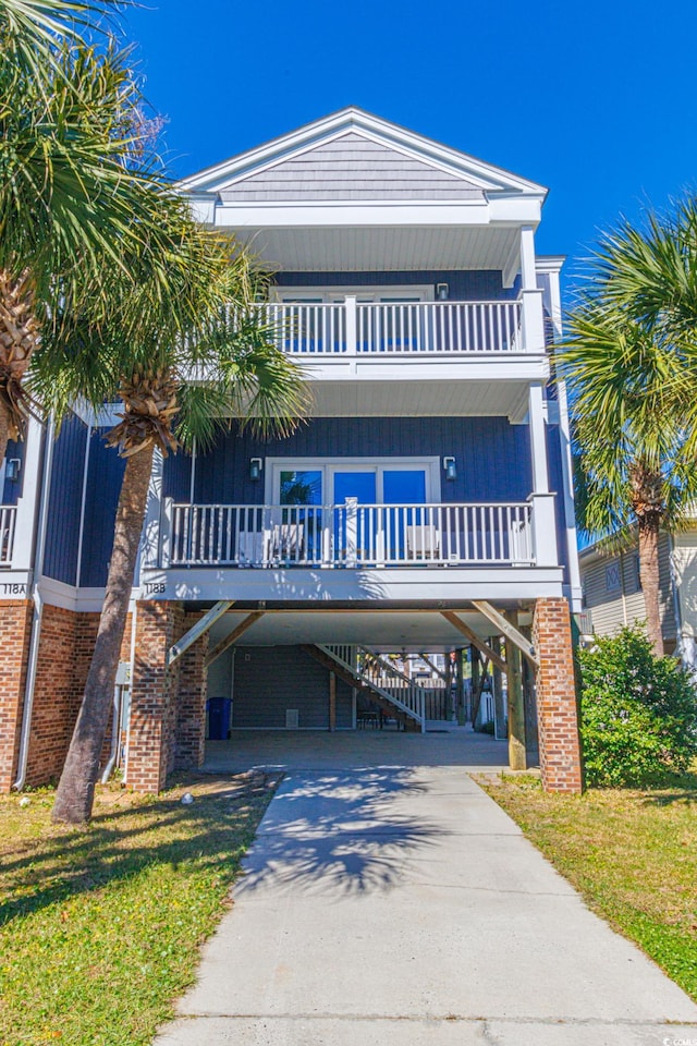 view of front of property featuring a carport