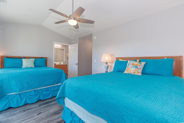 bedroom with lofted ceiling, hardwood / wood-style floors, and ceiling fan