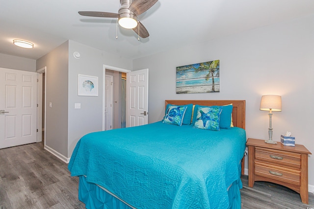 bedroom with ceiling fan and wood-type flooring