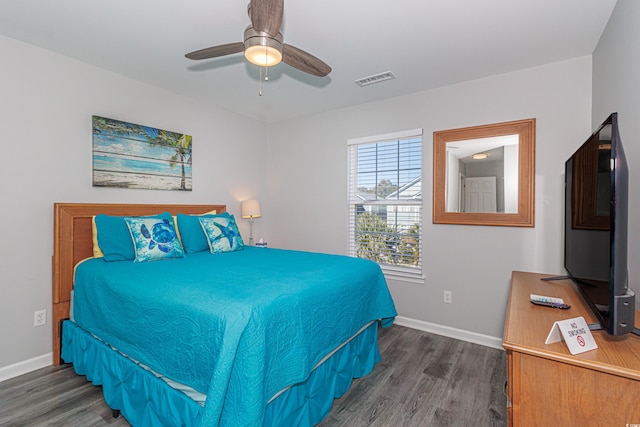 bedroom featuring dark wood-type flooring and ceiling fan