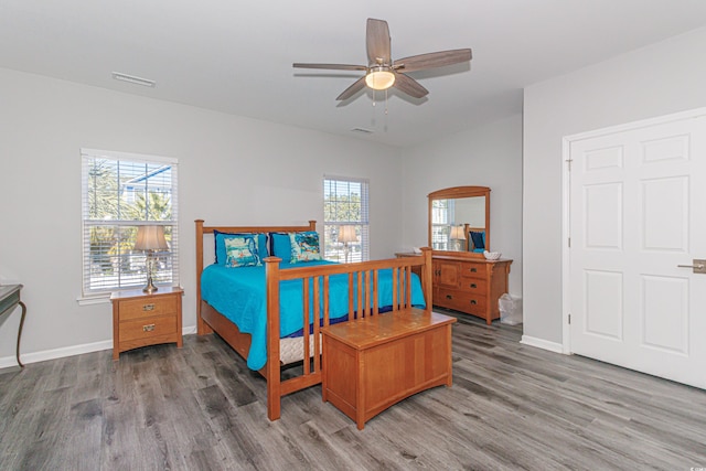 bedroom featuring ceiling fan and hardwood / wood-style floors