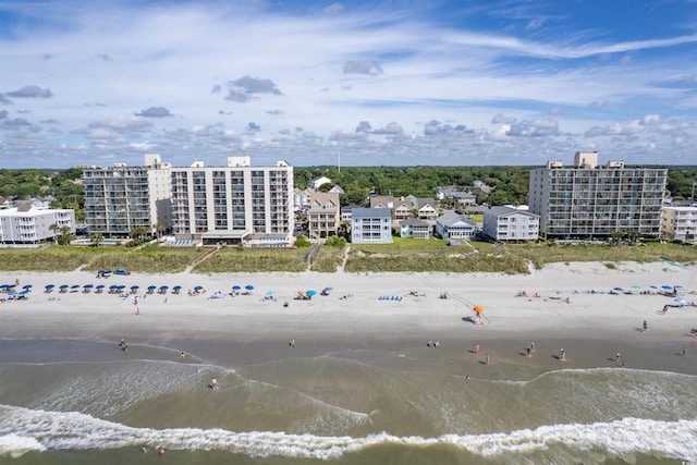 aerial view featuring a view of the beach and a water view