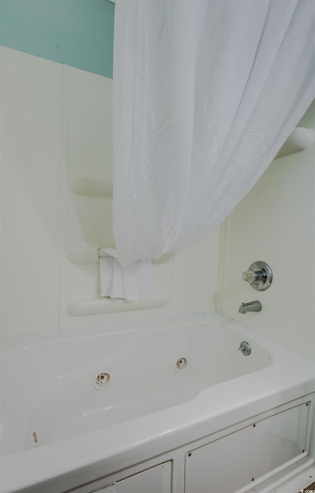 bathroom featuring a combined bath / shower with jetted tub