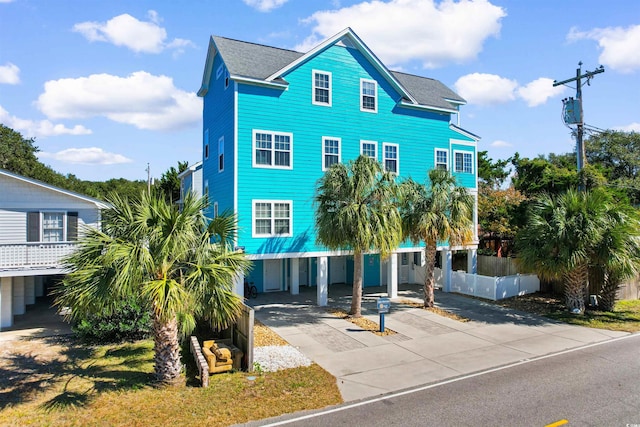 view of front facade with a carport