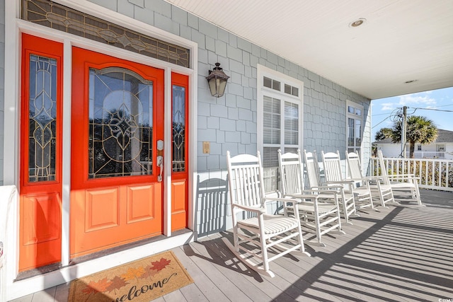 property entrance with covered porch