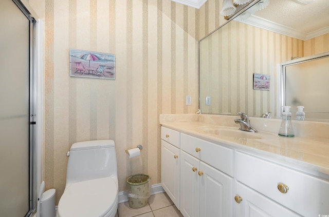 bathroom with vanity, toilet, crown molding, and a textured ceiling