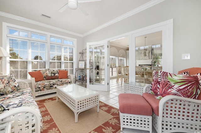 sunroom with ceiling fan