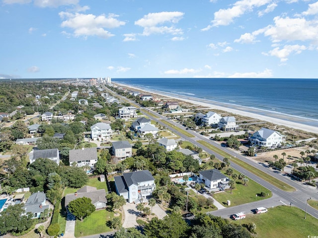 bird's eye view featuring a water view and a view of the beach