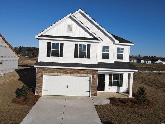 view of front of property with a garage