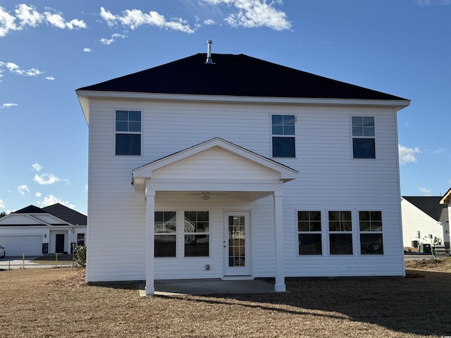 back of house with a patio area and ceiling fan