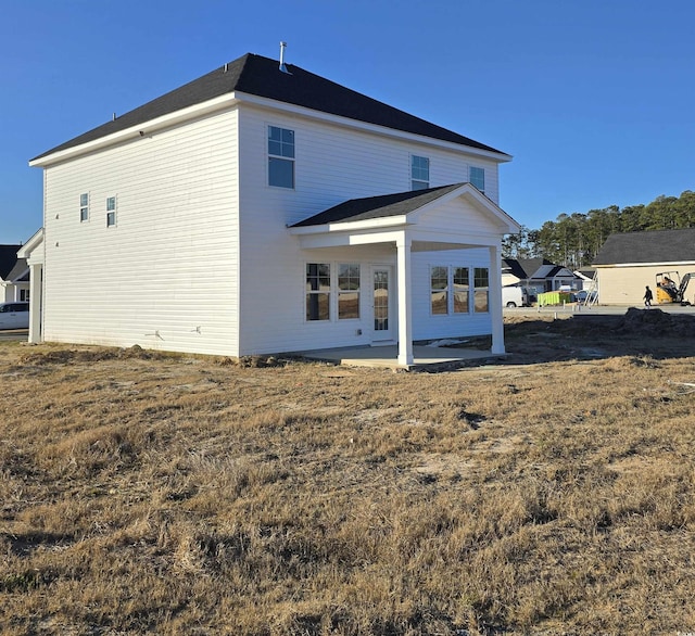 rear view of house featuring a patio area