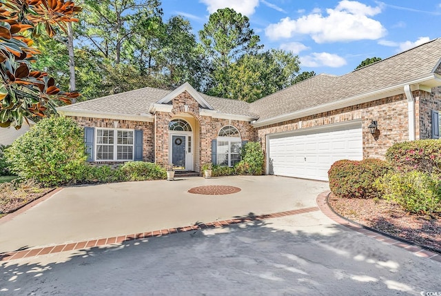 view of front of property featuring a garage