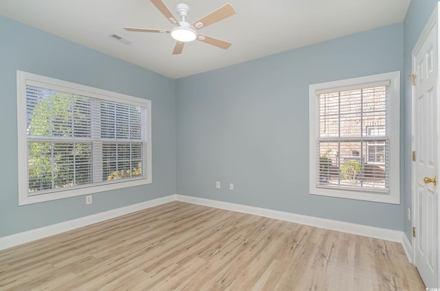 unfurnished room with light hardwood / wood-style floors and ceiling fan