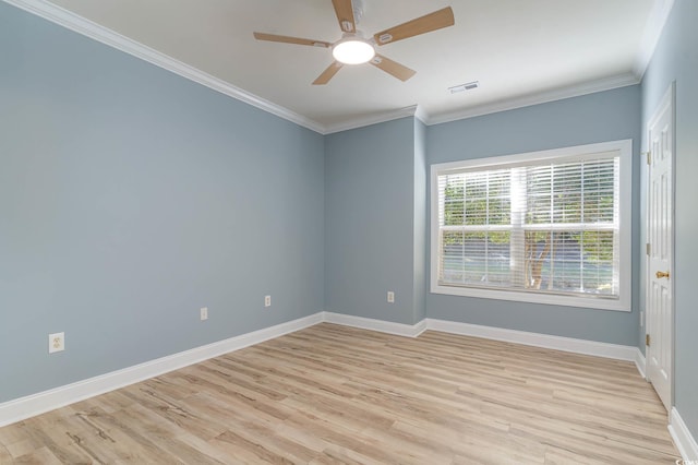 unfurnished room featuring light hardwood / wood-style floors, crown molding, and ceiling fan