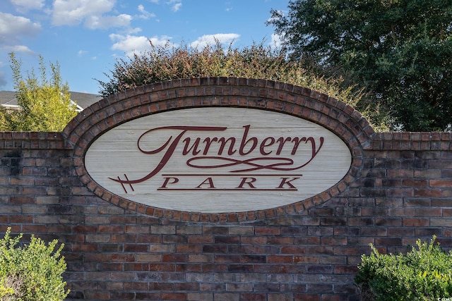 view of community sign