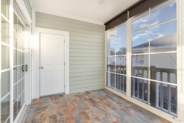 view of unfurnished sunroom