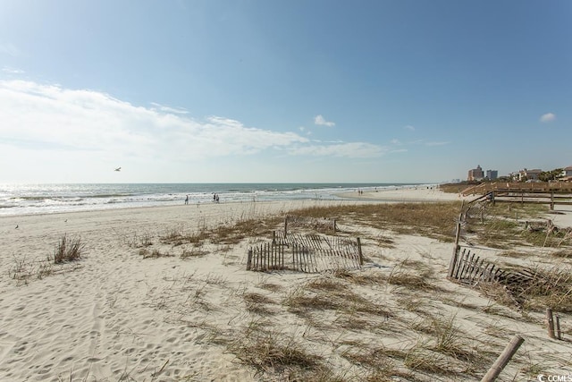 property view of water featuring a view of the beach