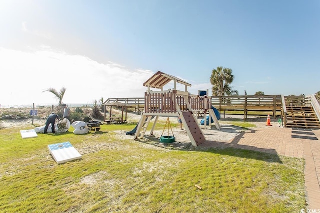 view of jungle gym with a lawn